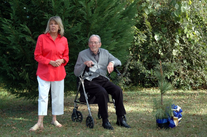 Kathryn Lewis, Director of "The Telling Trees" making "Moon Pine" presentation to Bill Mauldin