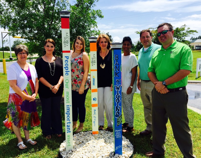 Centennial poles Bank of Wiggins